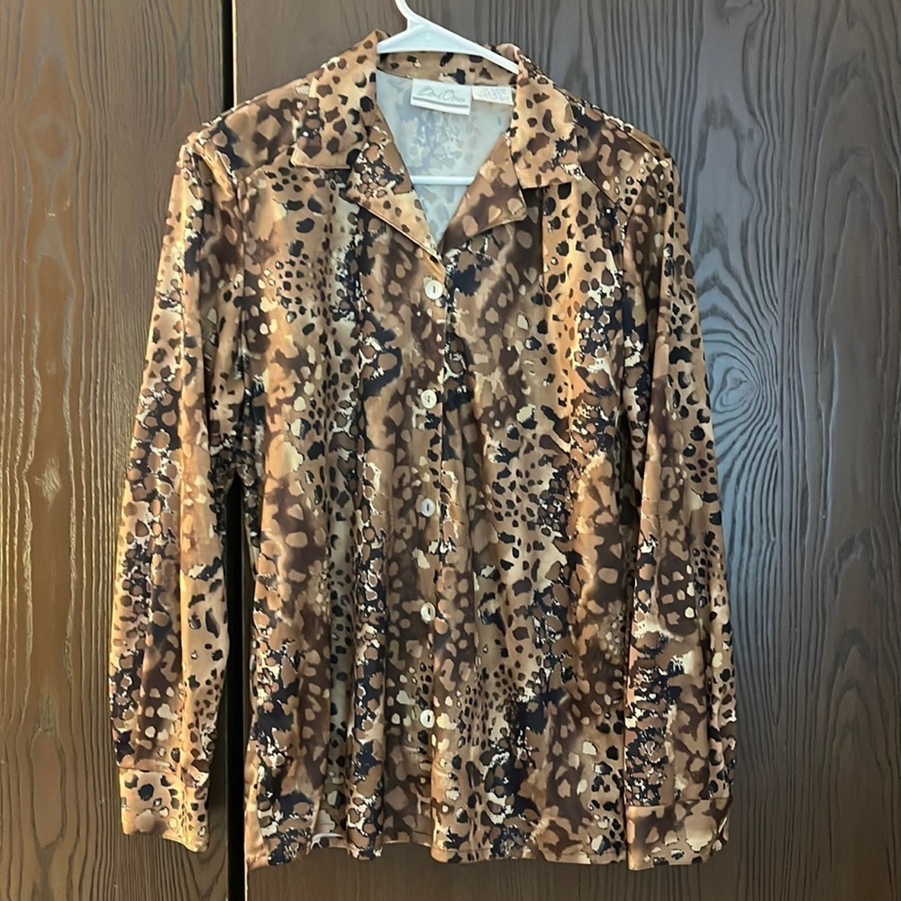 Bend Over long sleeved animal print blouse in black and browns. Size Small